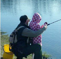 Man and small son fishing at Lake Erie